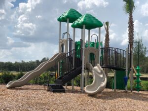 Green and Beige Playground in Lake Denham