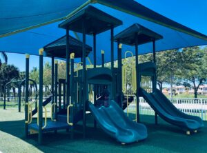 Teal Playground with shade overhead